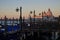 Gondole Stazio Danieliin on sunrise, with multiple moored and covered gondolas in the foreground. Venice, Italy