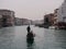 Gondolier Boatman Rowing Gondola in Venice