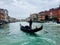Gondolier on Canal, Venice, Italy