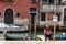 Gondolier dressed in traditional red striped top and straw hat with red ribbon