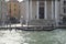 Gondolier Driving His Gondola The Grand Canal In Venice. Travel, holidays, architecture. March 28, 2015. Venice, Veneto region,