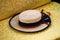 Gondolier hat, lying on the seat of the gondola, closeup. Venice