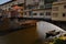 Gondolier on river Arno below Ponte Vecchio Florence