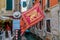 Gondolier straw hat next to the Venetian at a gondola stop in Venice Italy