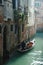 Gondolier taking tourists on Venice canals