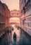 Gondoliers row under the Bridge of Sighs