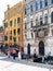 Gondoliers and tourists on waterfront in Venice