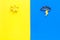 Good and bad weather concept. Template for forecast. Sun vs cloud and lightening on yellow and blue background top view