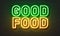 Good food neon sign on brick wall background.