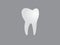 A good human tooth on dark background