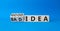 Good idea and bad idea symbol. Turned cubes with words Bad idea and Good idea. Beautiful blue background. Business concept. Copy