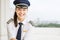 Good looking commerical pilot woman at the airport. Aviation