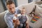 Good-looking father looking attentive reading about vitamins