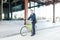 Good Looking Male Executive Going To Office With Bicycle