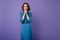 Good-looking pensive girl in long skirt looking away during photoshoot. Indoor portrait of concentr