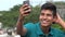 Good Looking Teen Boy Taking Selfy And Smiling