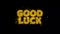 Good luck text sparks particles on black background.