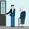 Good manners. man open the door to an elderly person.tired woman.etiquette.polite man