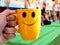 Good Morning-Coffe Mug Holding in Hand With Smiley on it.
