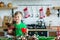 Good morning. A little boy drinks tea at the kitchen table and hugs a teddy moose. A time of miracles and fulfillment of desires