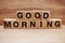 Good morning wooden letter alphabet on wooden background