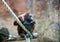 A good-natured orangutan sits on a tree.