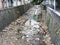 Good Samaritan Responsible Citizen Man clearing drains on Port-Louis Mauritius