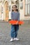 Good for transportation. Little child hold penny board outdoors. Transportation concept. Summer transport. Recreational