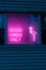 Good vibes only neon sign on blue wall background