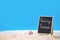 Goodbye Summer text blackboard on the beach with blue sea and clear sky image for outdoor advertising poster summer beach vacation