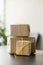 Goods delivery service beige gift boxes stack