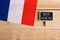 goods and services concept - french country& x27;s flag, blackboard with text Buy local