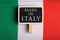 goods and services concept - Italian country's flag, blackboard with text Made in Italy