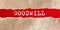 Goodwill text appearing behind on torn paper