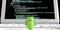 Google Android OS logo mascot standing alone facing computer screen with code