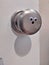 Googly eyes on a door knob, creating a surprised expression