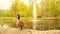 Goose standing in front of the water fountain