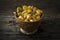 Gooseberries in Bowl on Rustic Wood