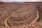 Gooseneck Canyon - Panoramic aerial view on the convolutions of San Juan River meandering through a horseshoe bend