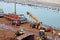 Gopalpur, India, November, 05, 2020. Accident at the port. Dump truck overturned while unloading iron ore. Work on lifting the tru