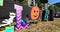 GoPro shot shows colorful letters spelling out the word Halloween