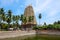 Gopura (tower) and temple tank of Hindu Tempe