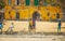 Goree island, Senegal- April 22 2019: Unidentified boys play soccer on the sand in the town in Africa. oys playing in front of an