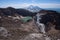 Gorely Volcanoâ€™s crater lake and itâ€™s impressive glacier with Mutnovsky Volcano in the background