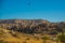 Goreme region, Cappadocia, Anatolia, Turkey: Flying in a balloon. Mountain view in summer in Sunny weather