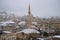 Goreme in snowfall in the gloomy January afternoon, Turkey