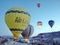 Goreme town. Cappadocia. Turkey. Balloon flight over the rocky valleys of Cappadocia at sunrise.