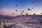 Goreme,Turkey- 17 October, 2019:Hot Air balloons flying tour over Mountains landscape autumn sunrice Cappadocia