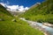 Gorezmettlenbach river with Swiss Alps Wandenhorn, Grassengrat and Chlo Spannort on Sustenpass, Switzerland, Europe