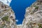 Gorge, overhanging rocks and rocks in mountainous area, during  day